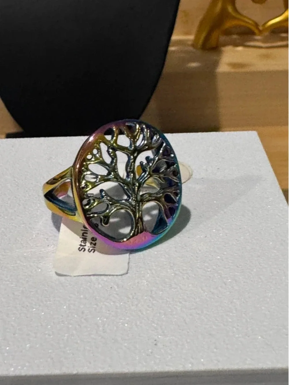 Stainless steel tree ring multitone color-shift finish. Size 15.